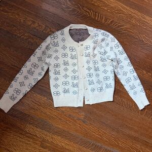 Patterned Cream Cardigan with Unique Design on Back